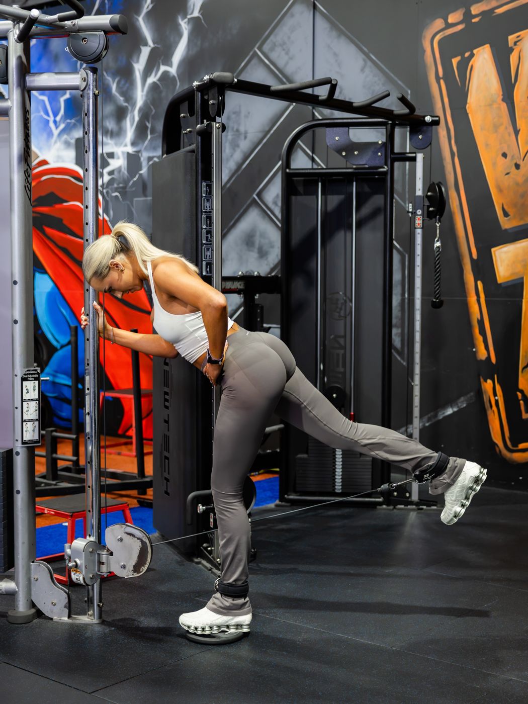 Member training cable kickbacks at Fitness 4U Traralgon